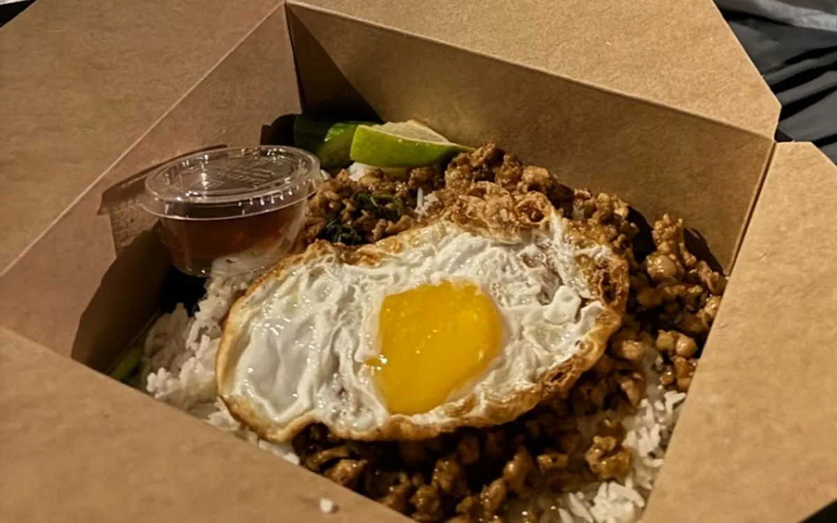 Rice topped with a fried egg at Little Pig