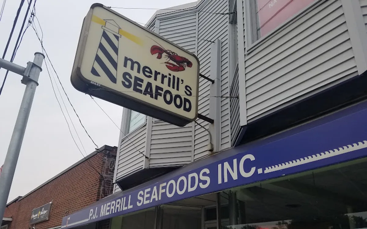 PJ Merrill Seafood’s sign and storefront on Forest Avenue, Portland, Maine, photographed in 2019