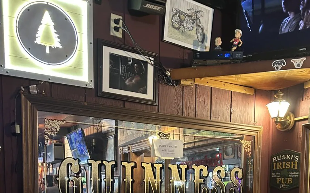 A booth and beer taps inside Ruski’s Tavern